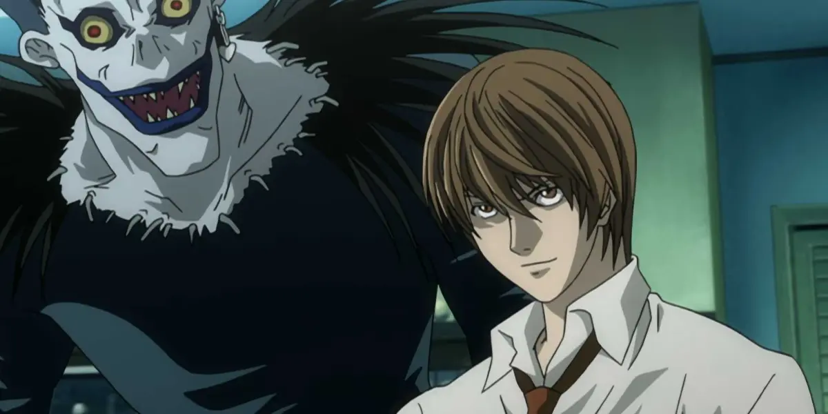 Light Yagami sits near Ryuk in his bedroom in Death Note
