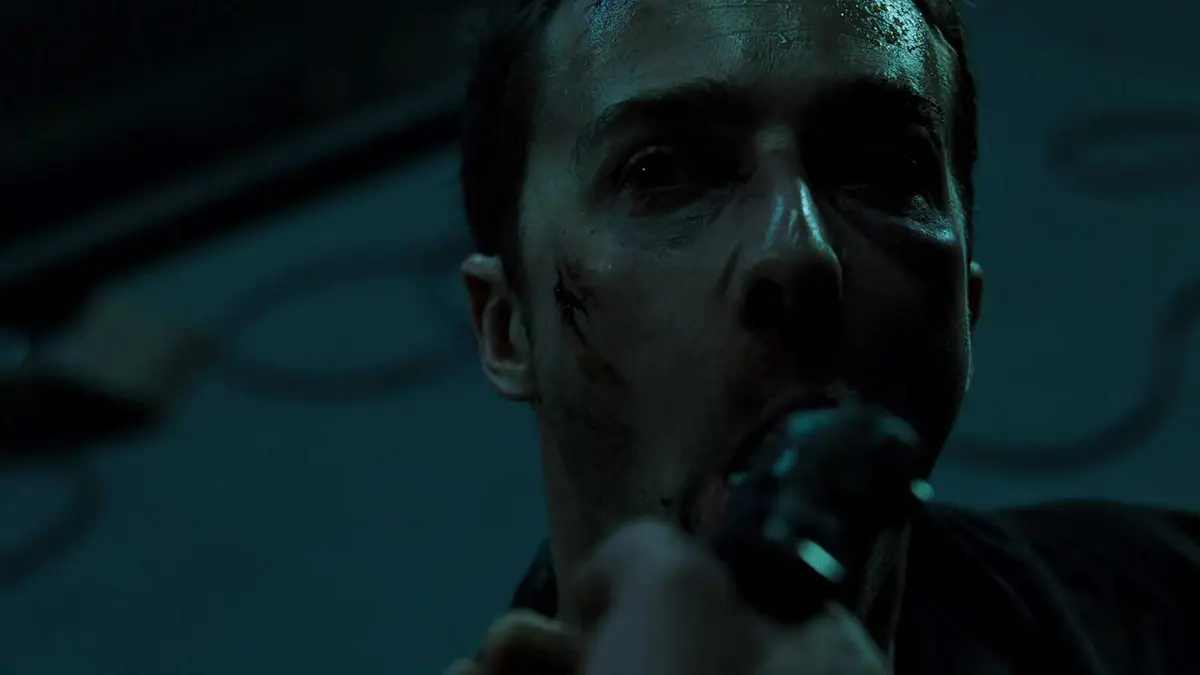 The Narrator with a gun in his mouth in the opening of Fight Club