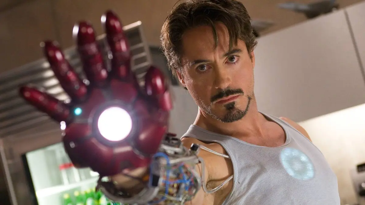 Tony Stark aiming his hand cannon in Iron Man 2008