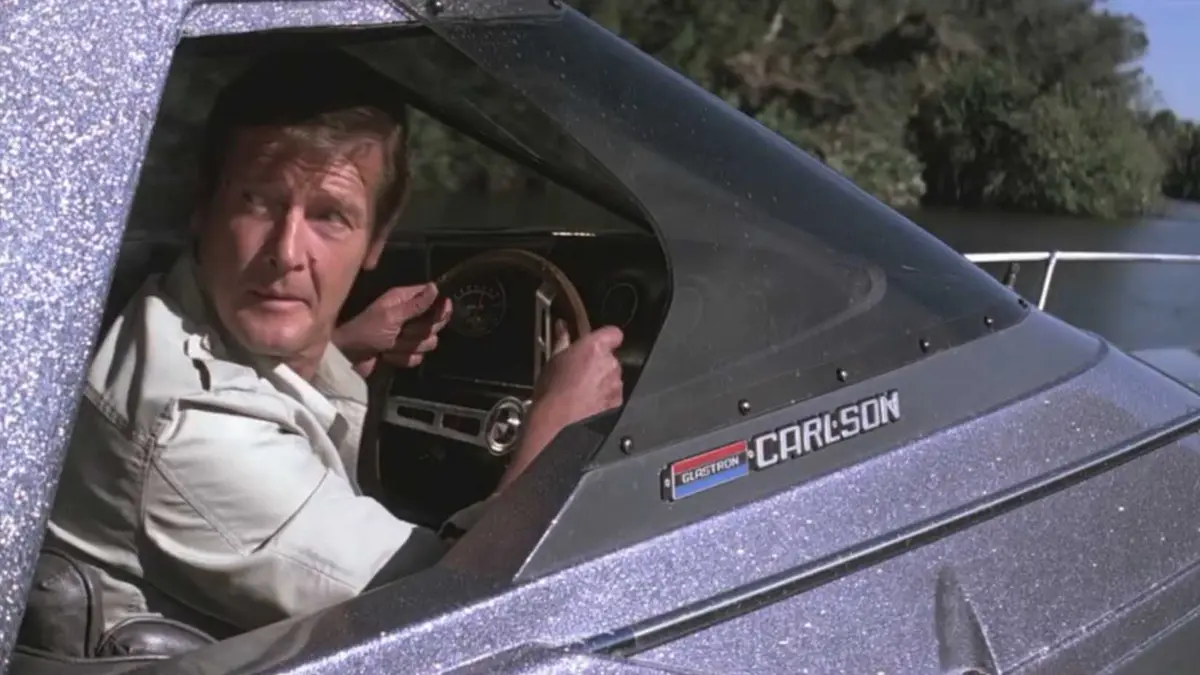 Roger Moore driving a speedboat in Moonraker
