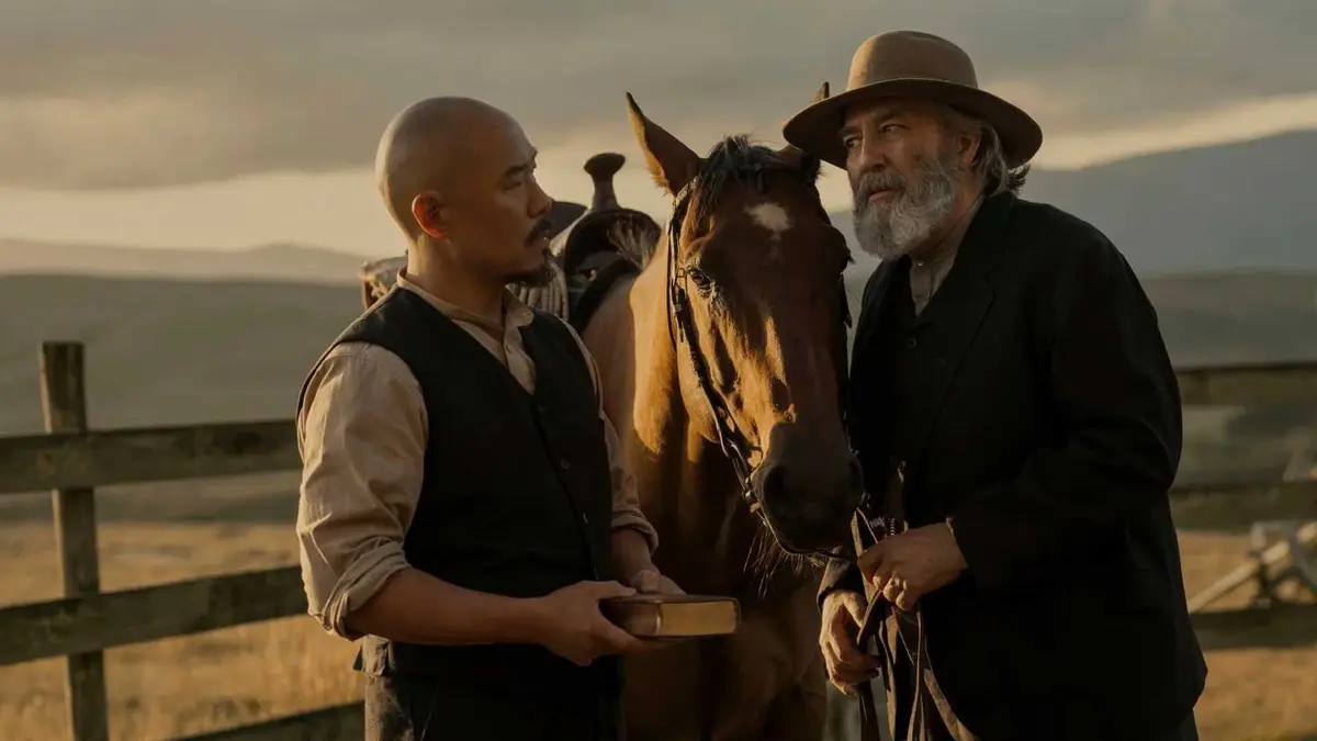 Lee and Samuel Hamilton talk next to a horse in East of Eden.