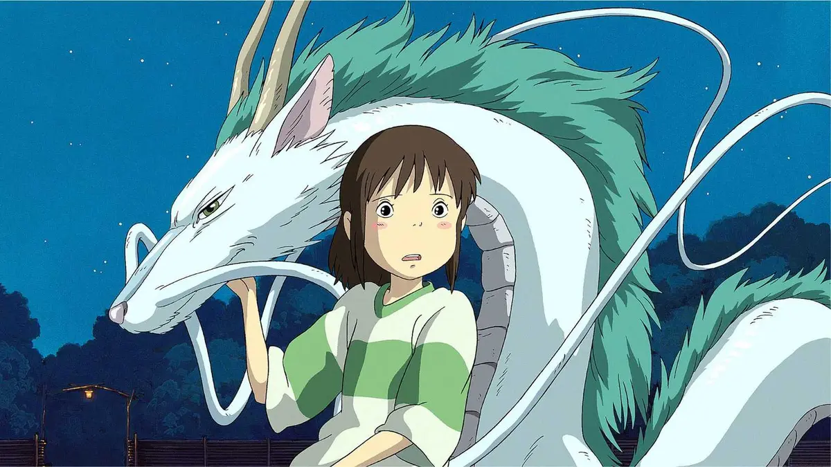 Chihiro with Haku in dragon form in Spirited Away