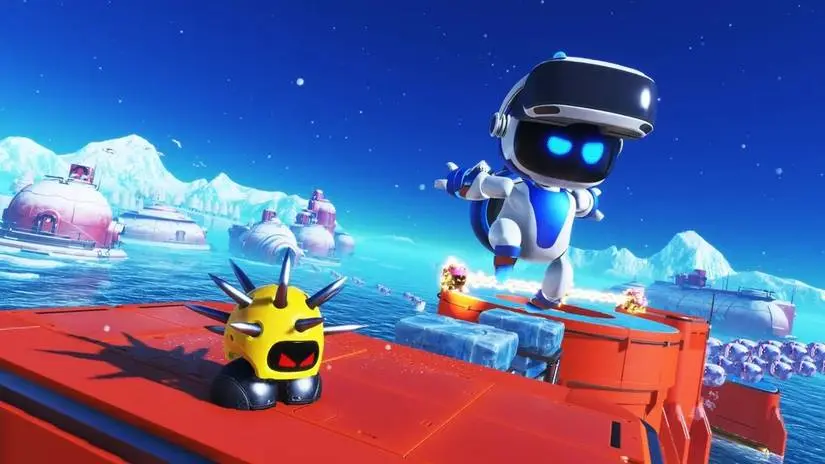 Astro Bot jumps away from a red platform with a yellow enemy on it