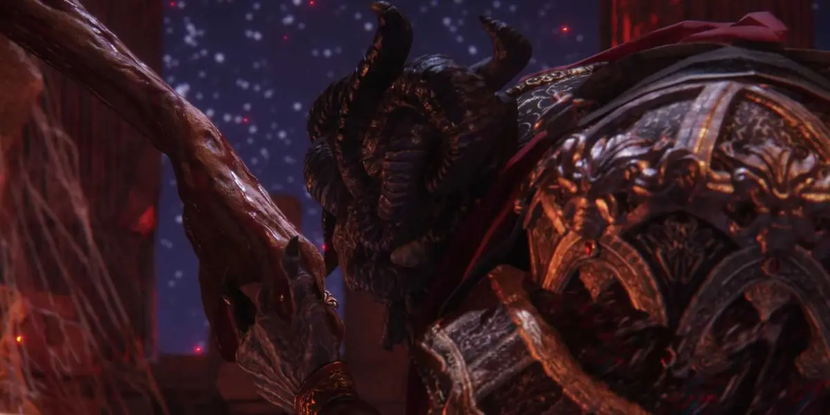 Mohg, Lord of Blood, kissing Miquella's Hand in Elden Ring