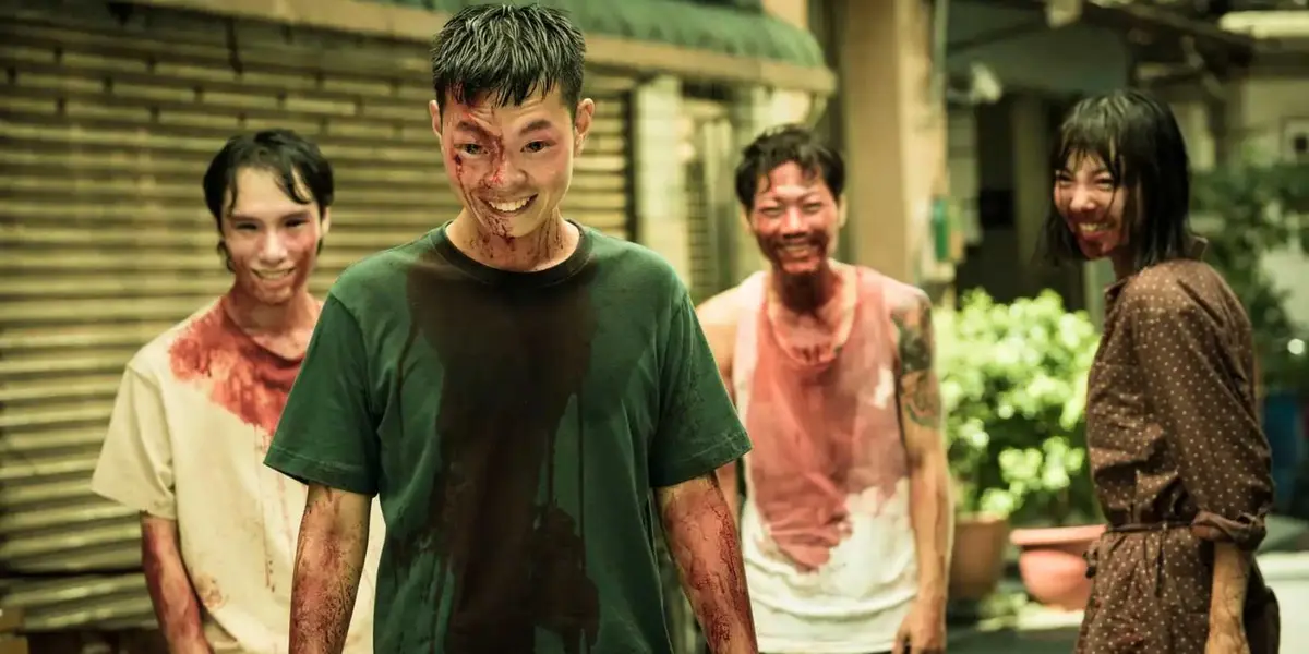 Four bloody and possessed people smiling with dark eyes in The Sadness