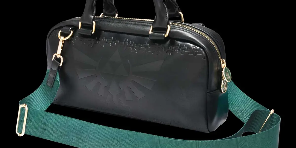 A bag with green handles with the Zelda logo on it
