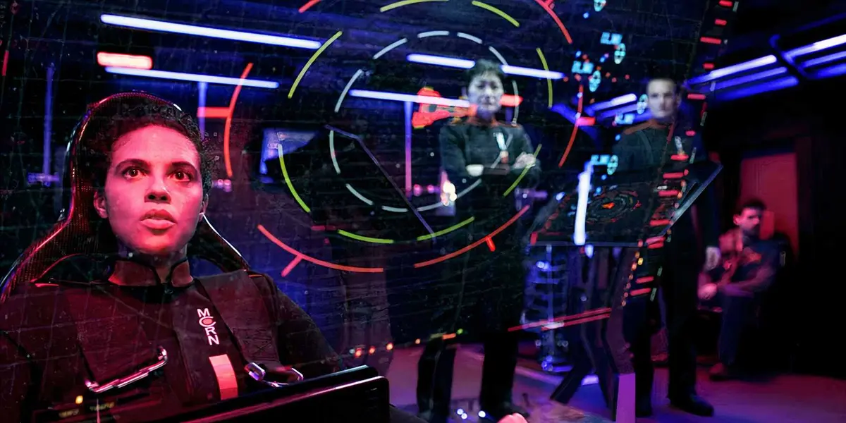 A navigator inspecting a screen in The Expanse episode CQB