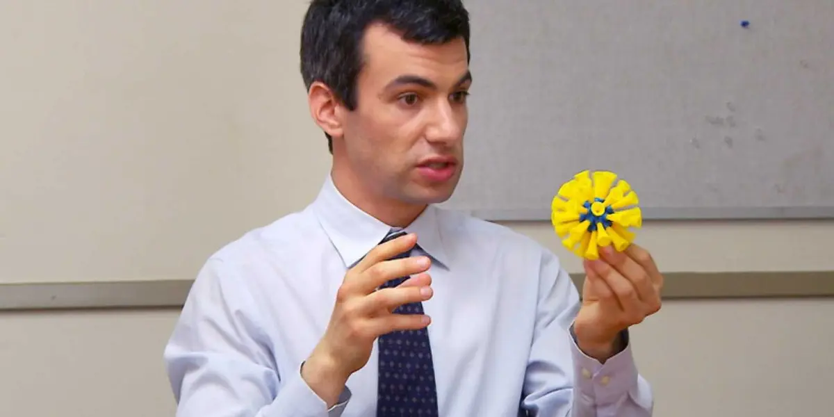 Nathan Fielder holding a toy in Nathan For You