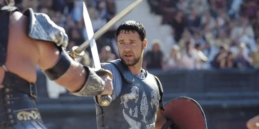 Maximus fighting someone in the arena in Gladiator