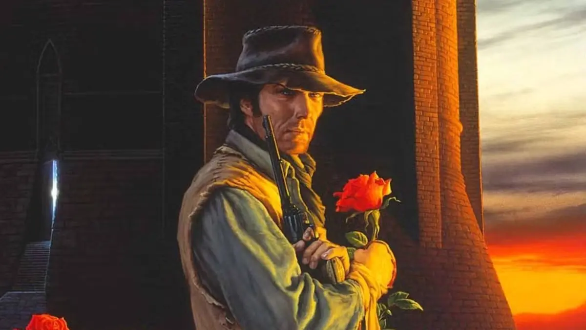 Roland from the Dark Tower stands with a rose in his hand and a cowboy hat on the cover of The Dark Tower book 7