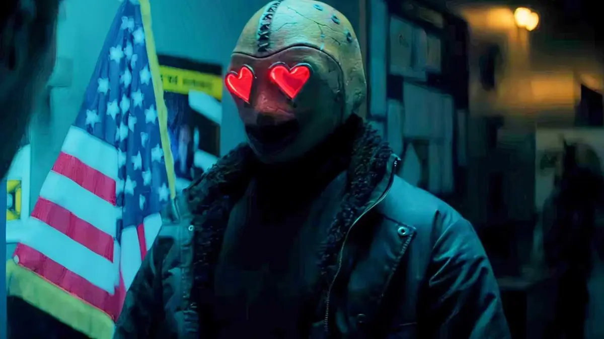 The Heart Eyes Killer with glowing eyes in a police station hallway in Heart Eyes