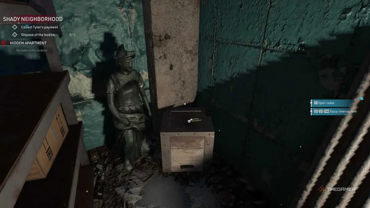 Kovalsky finds a key next to a statue in Crime Scene Cleaner