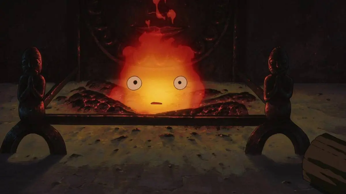 A worried Calcifer talks to Howl in Howl's Moving Castle.