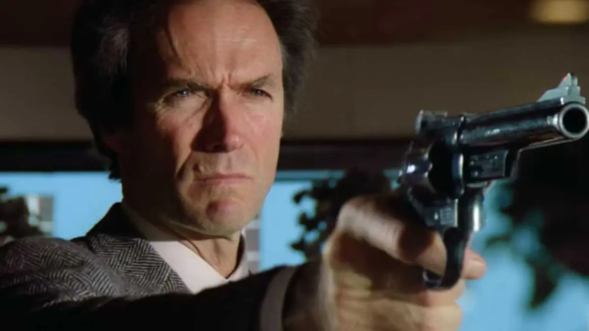 Clint Eastwood as Dirty Harry pointing a gun in Sudden Impact