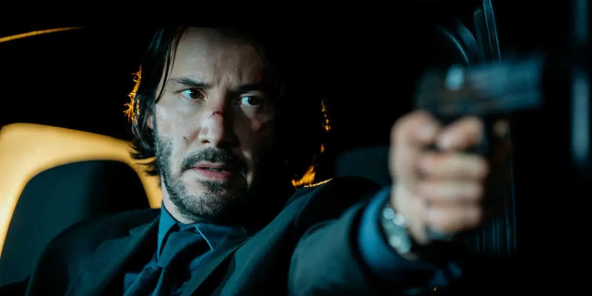 Keanu Reeves' character with a gun in the original John Wick