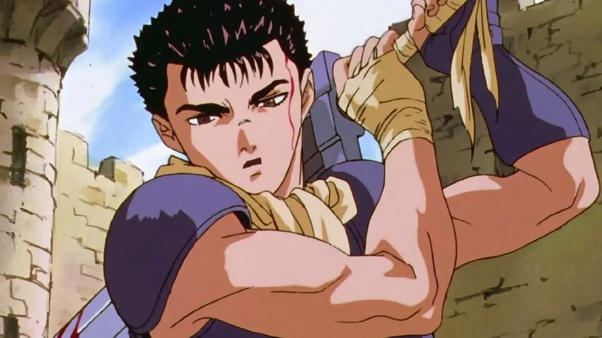 Blooded young Guts stands with a sword on his shoulder in Berserk (1997).