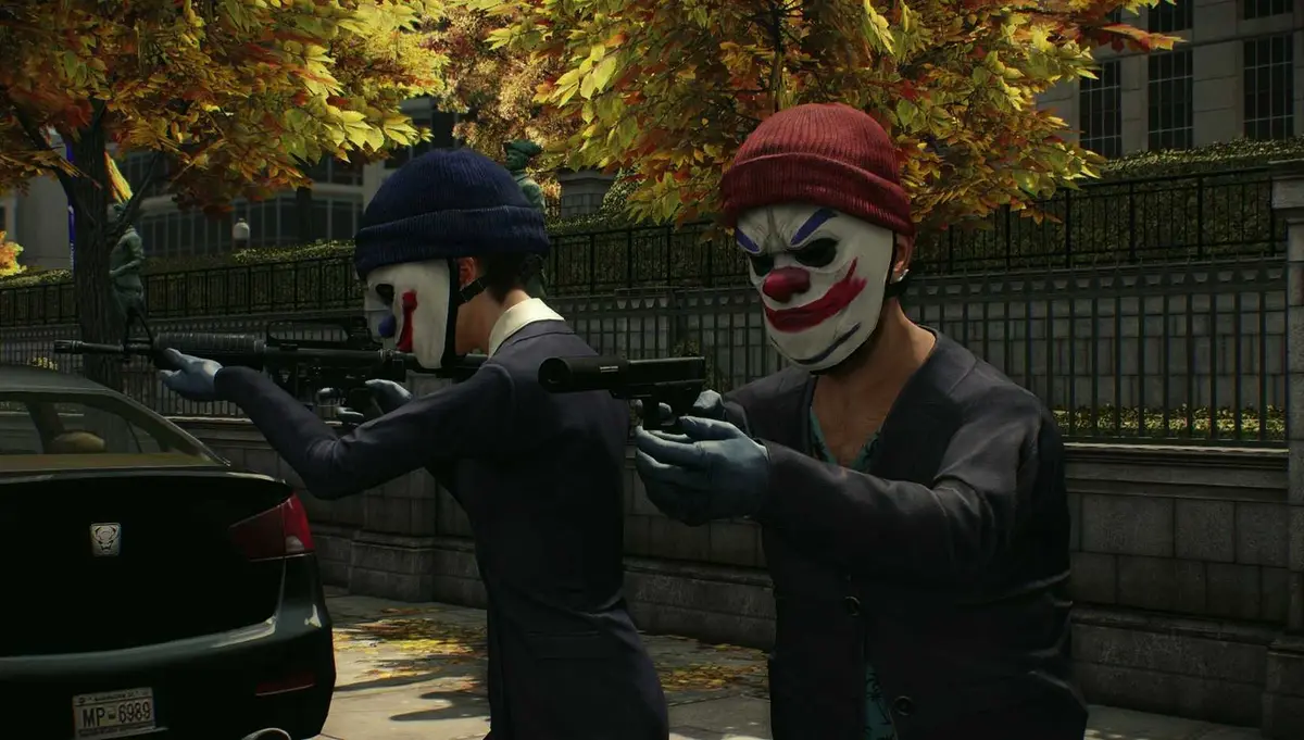 Ethan and Hila Klein masked up with guns in Payday 2.