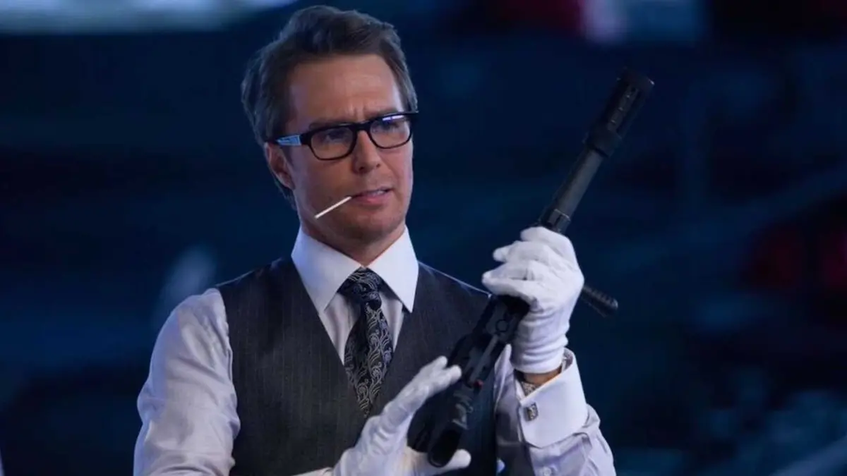 Sam Rockwell as Justin Hammer with a gun in Iron Man 2