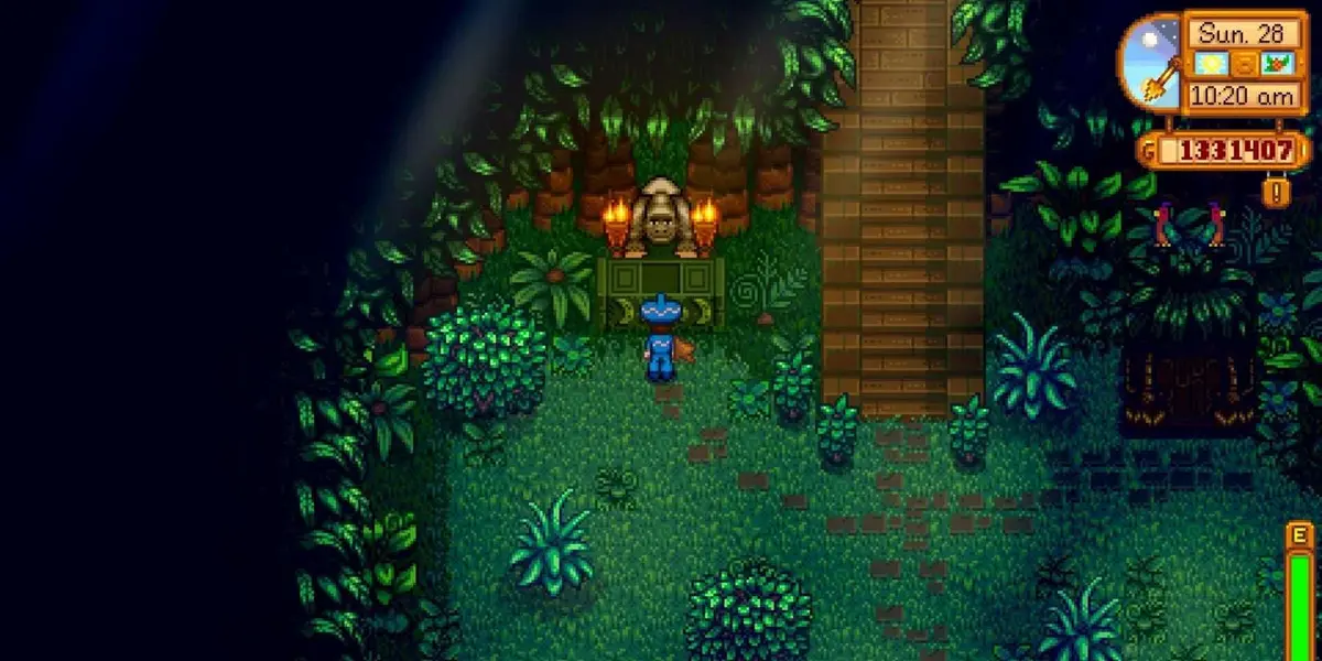Character in jungle by standing in front of a shrine by some stairs