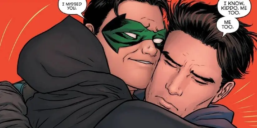 Nightwing hugs Damian's Robin