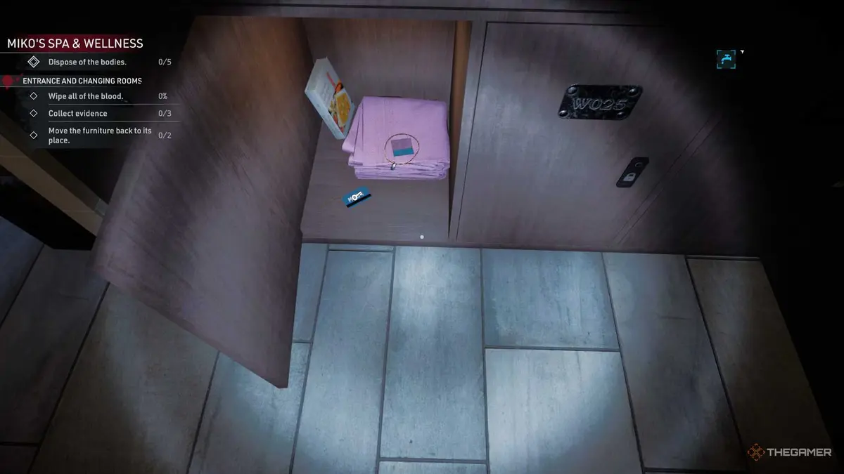 Kovalsky opens a locket and finds a blue keycard in Crime Scene Cleaner