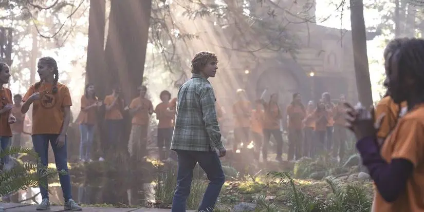 Camp Half-Blood cheers for Percy Jackson (Walker Scobell) at his return