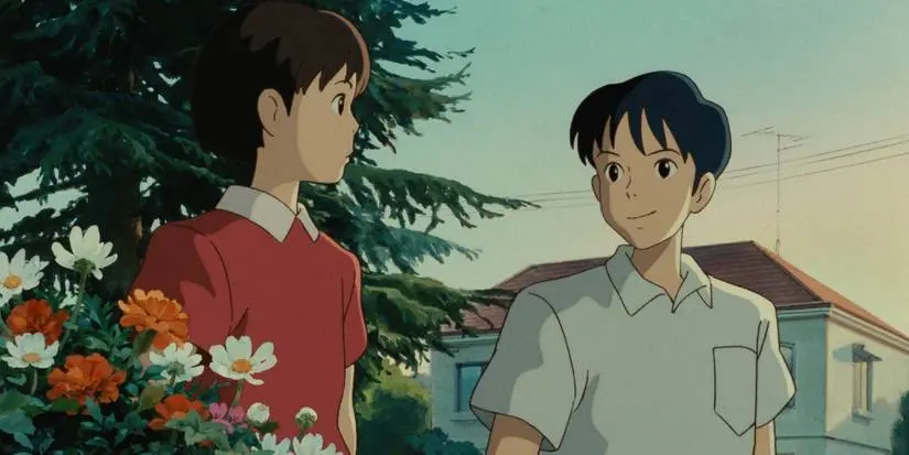 Shizuku and Seiji walk and talk near flowers in Studio Ghibli's Whisper of the Heart.