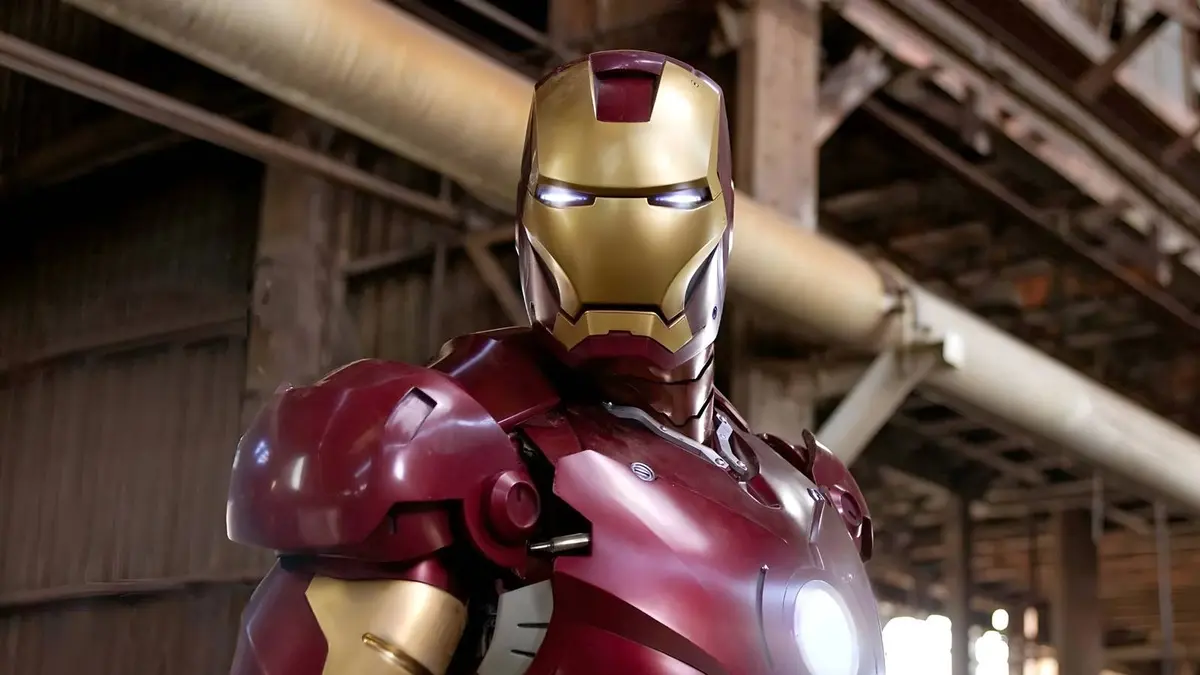 Iron Man standing in a warehouse in Iron Man.