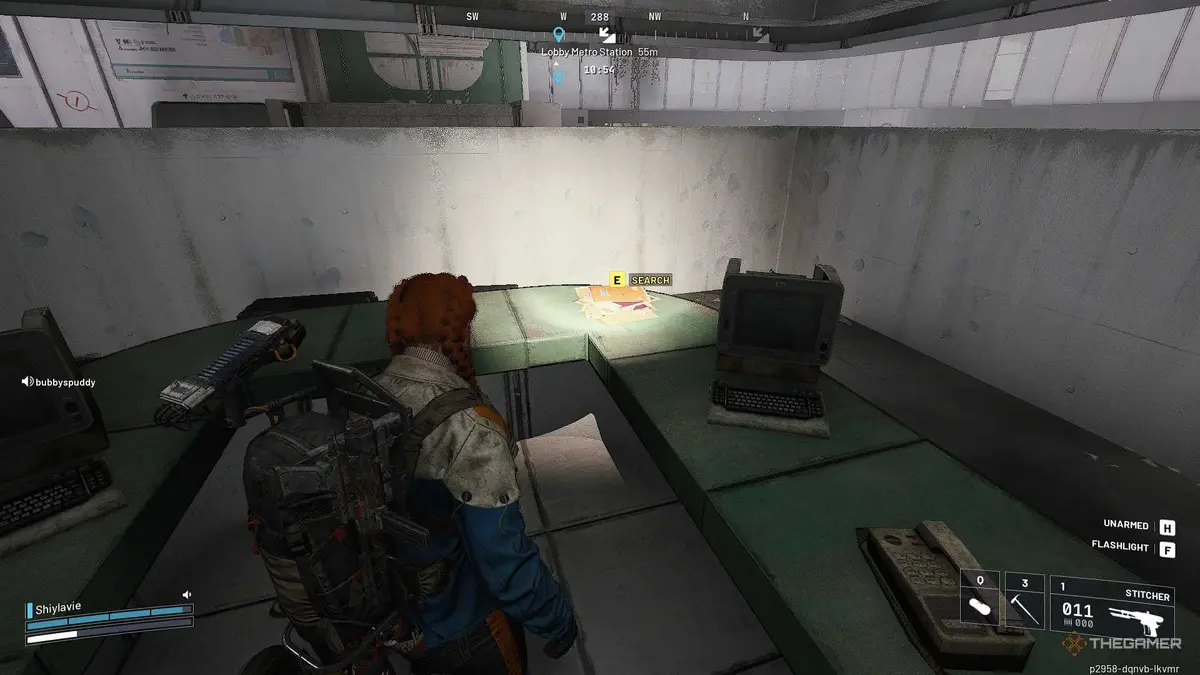 ARC Raiders searching glowing yellow papers in the security office.
