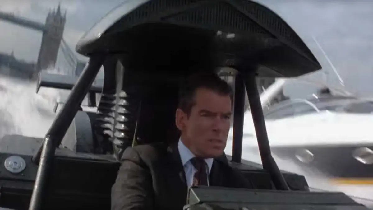 Pierce Brosnan in a speedboat on the thames in the world is not enough