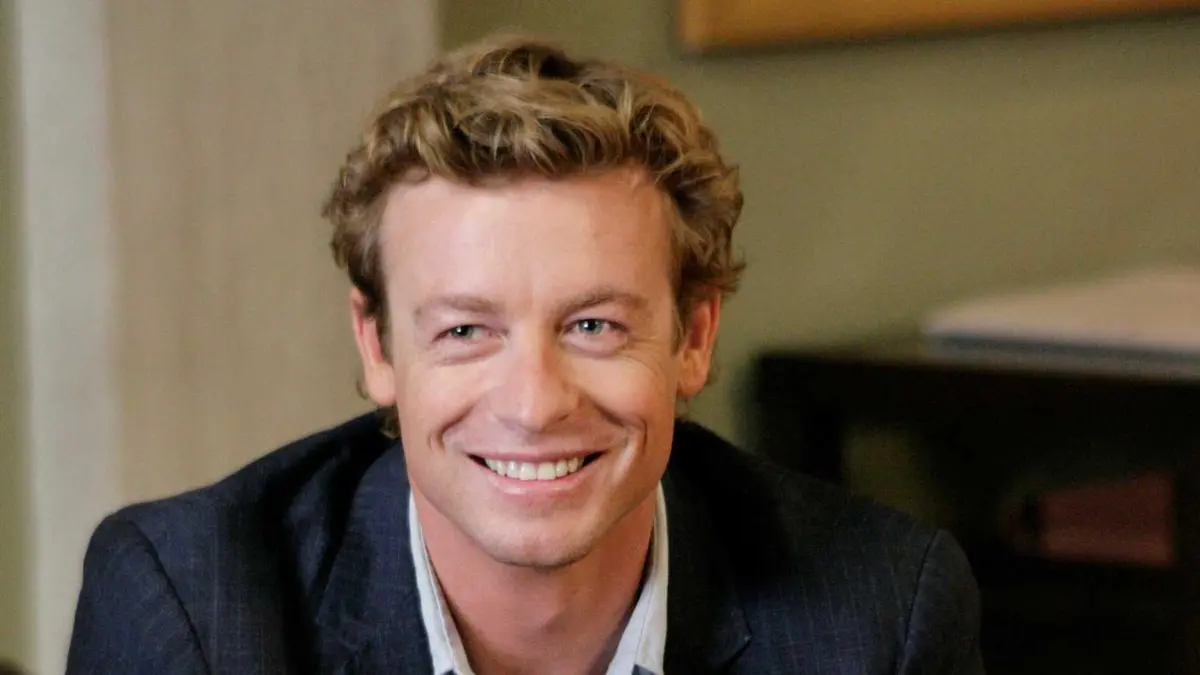 Patrick Jane (Simon Baker) smiling in The Mentalist.