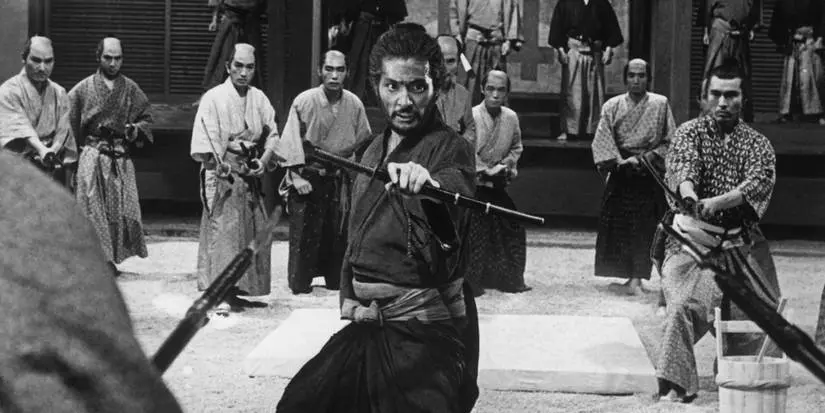 A still form Harakiri with a warrior being surrounded by many others.
