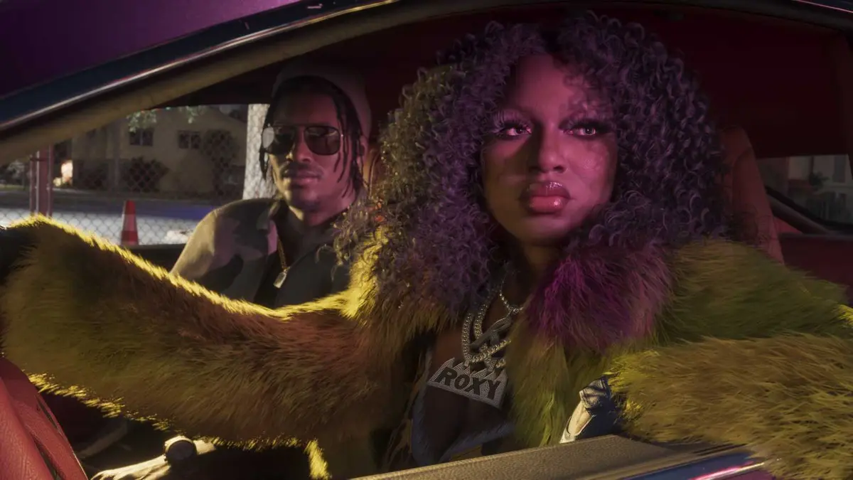 Real Dimez looking out the window of her car with her hand on the wheel in Grand Theft Auto 6.