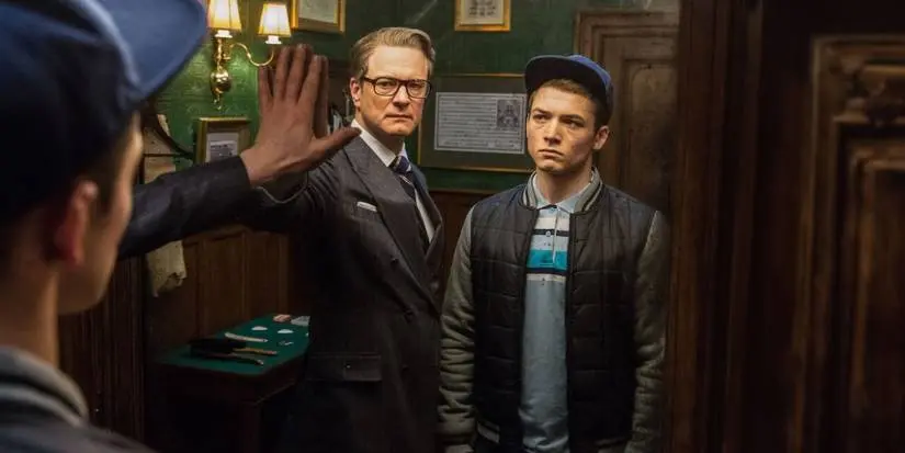Colin Firth as Harry Hart/Galahad and Taron Egerton as Gary "Eggsy" Unwin from Kingsman: The Secret Service (2015)