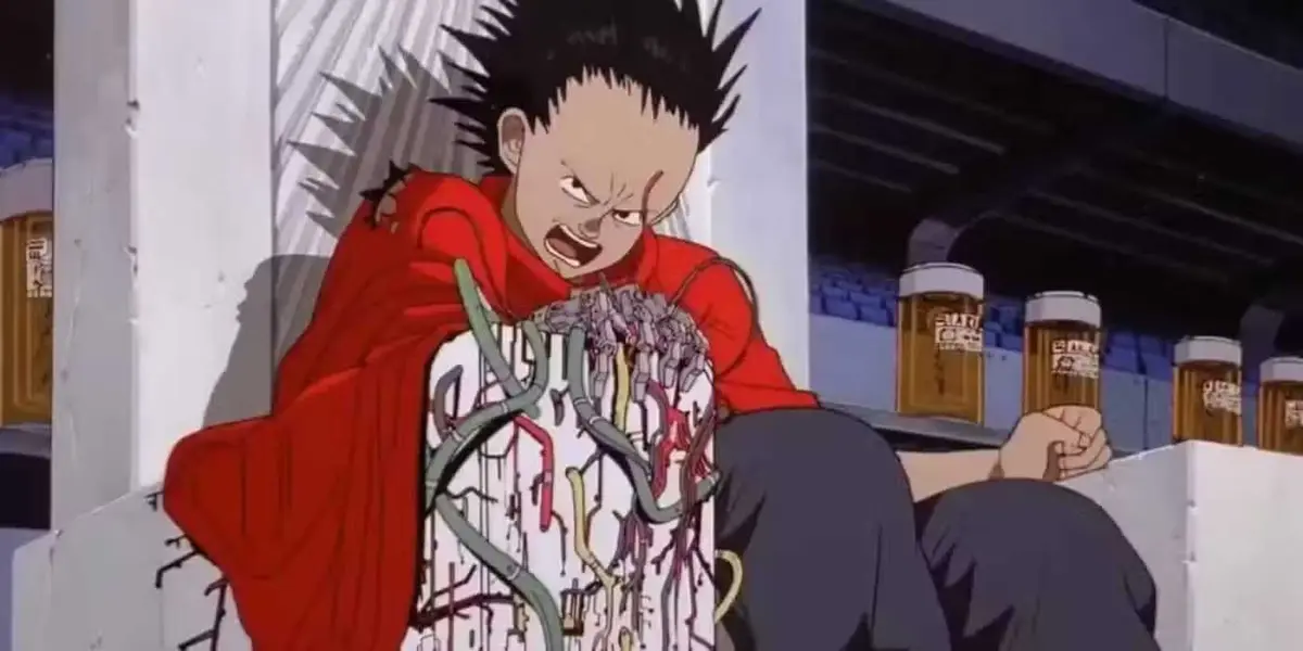 Tetsuo glares and sits on a throne in Akira.