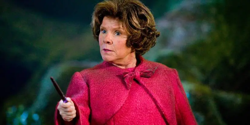 Dolores Umbridge holding out her wand in Harry Potter.