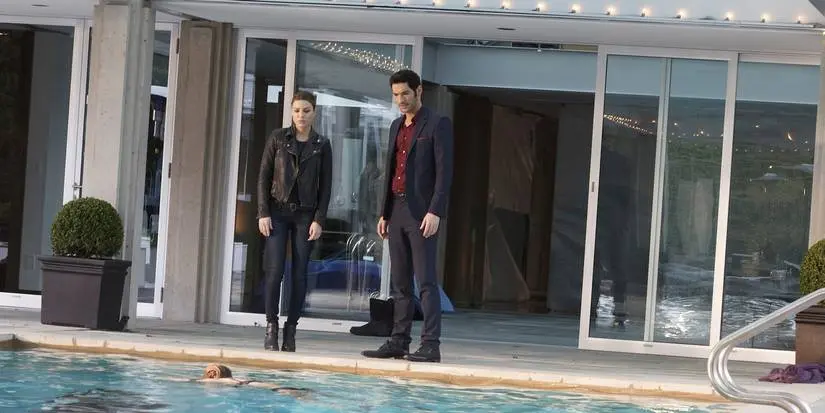 Lucifer and Chloe look at a body in a pool