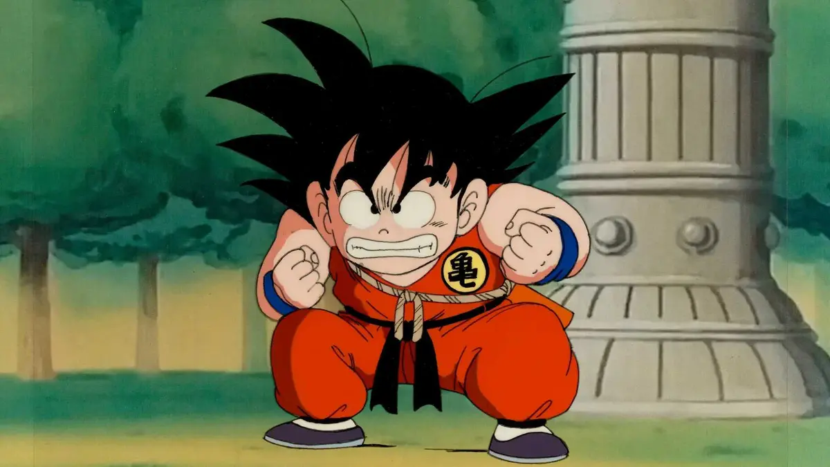 An angry kid Goku prepares to fight in Dragon Ball.