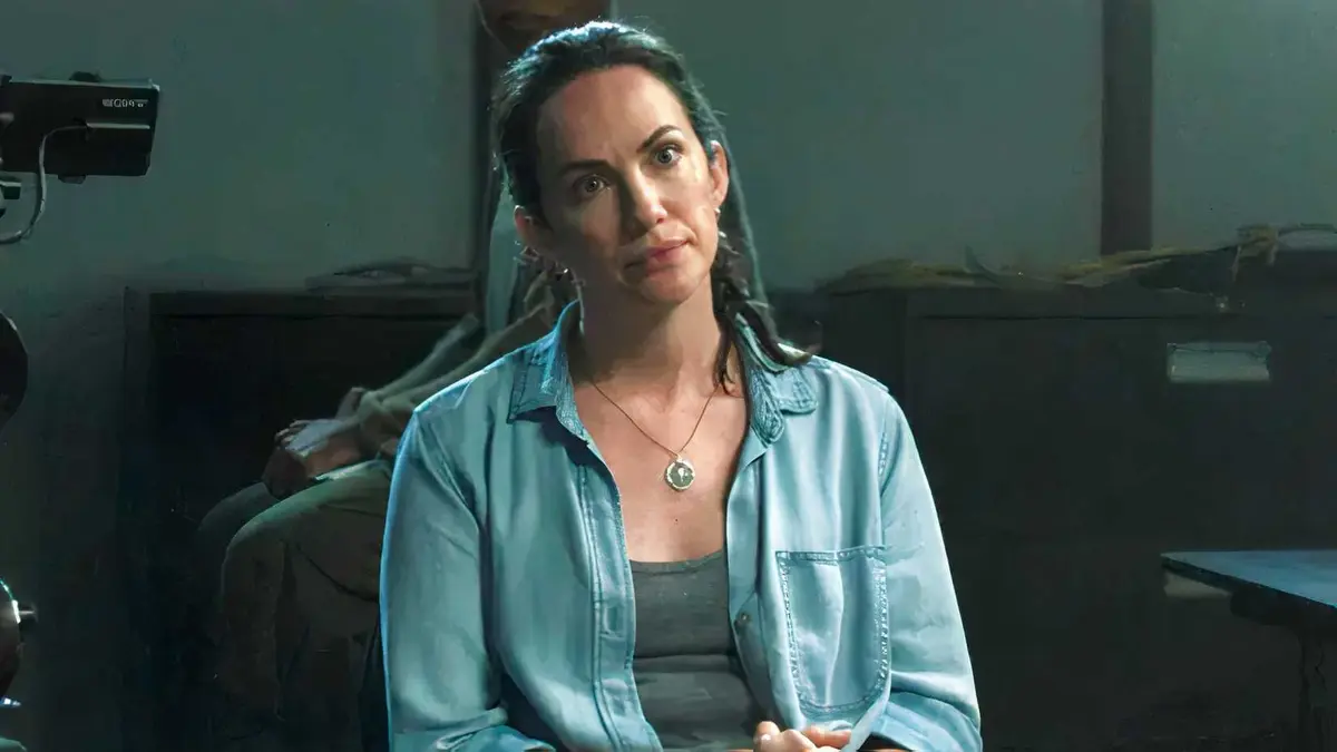 Kate Siegel as Adelaide looking sternly offscreen in Carrie