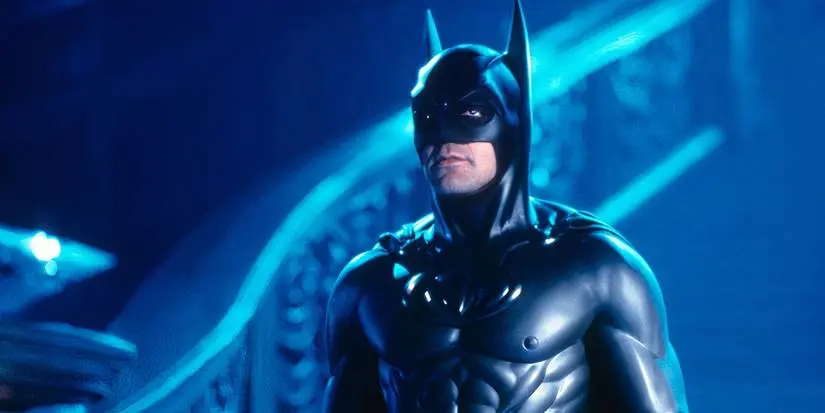 George Clooney as Batman in Batman & Robin looking offscreen