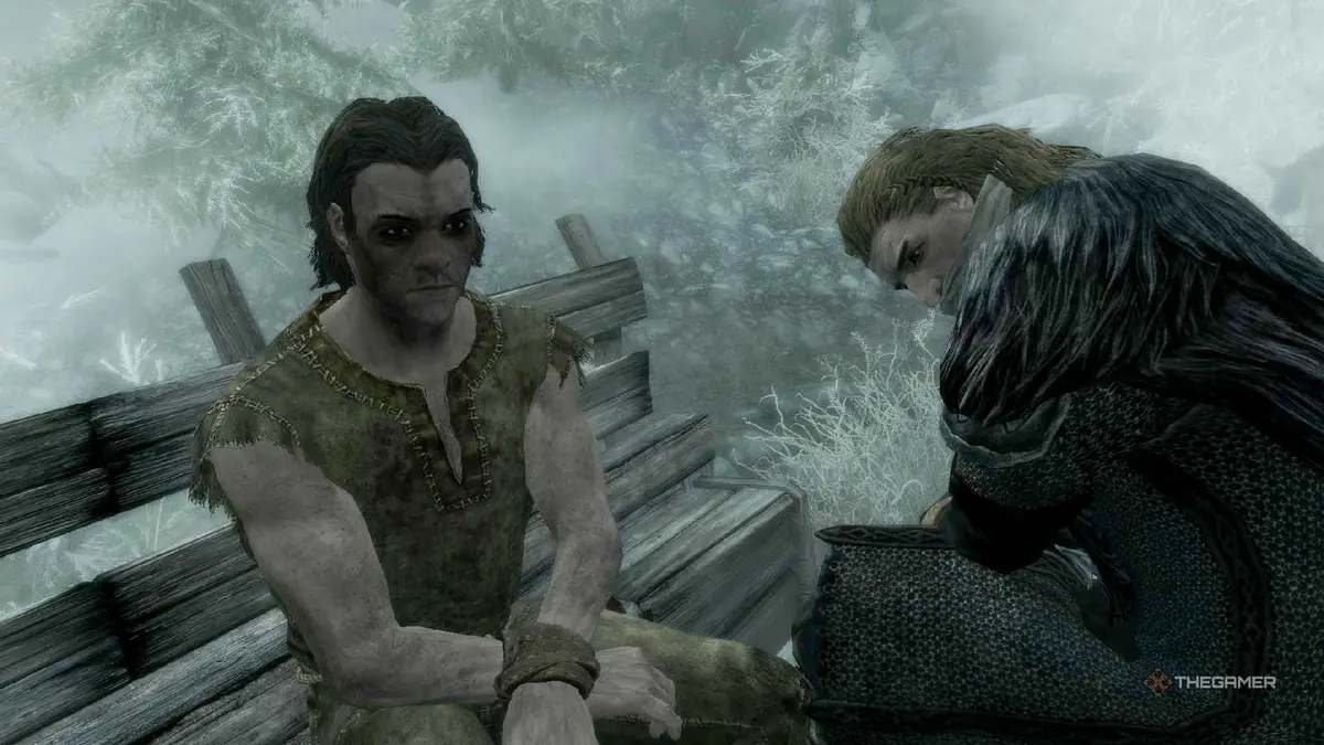 Skyrim opening showing two prisoners sat down in a cart.
