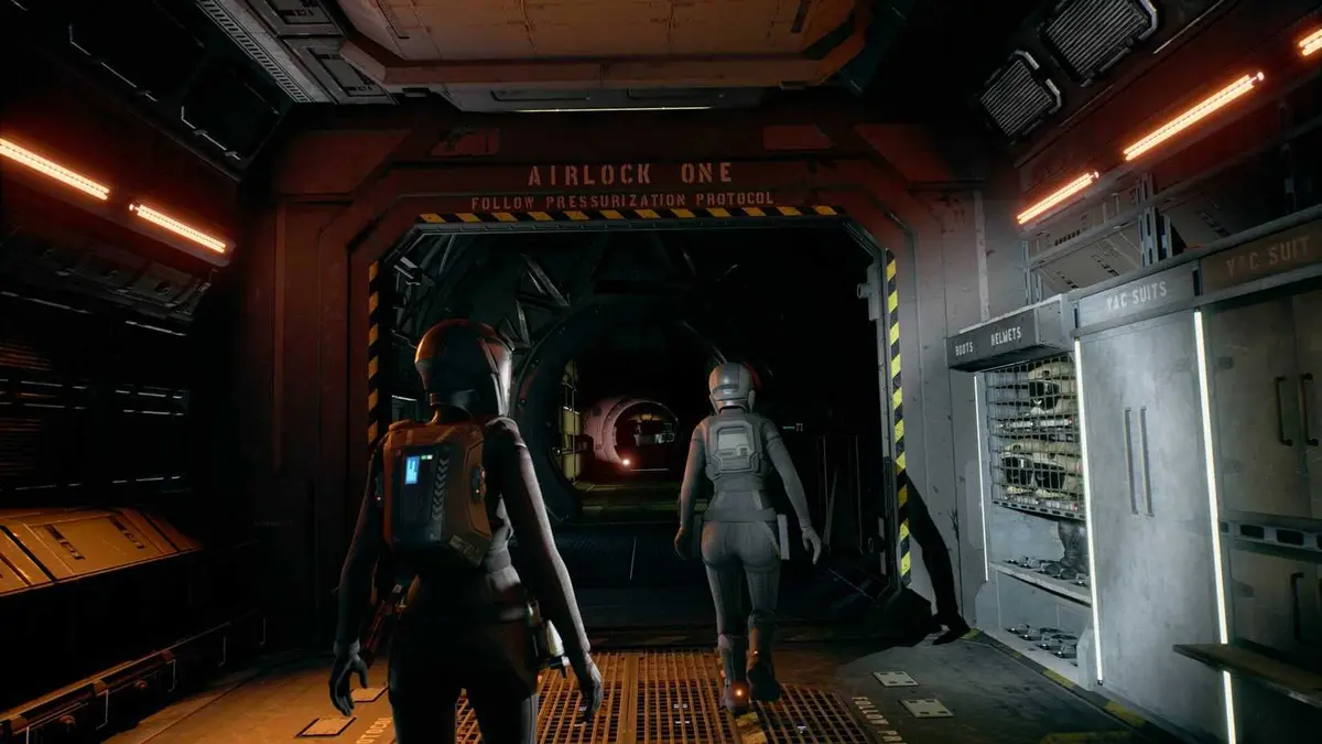 Two characters walking down a corridor in The Expanse A Telltale Series game.