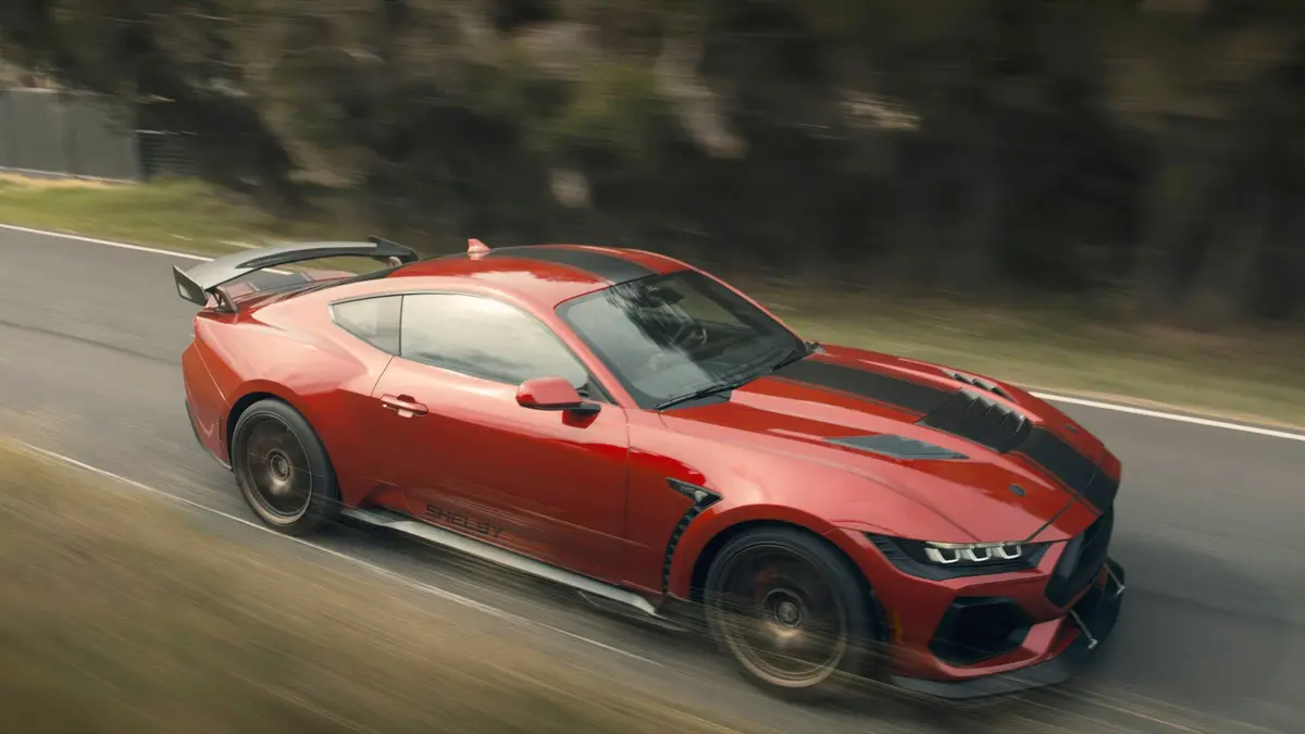 Liam Neeson's red mustang zooming along in The Mongoose