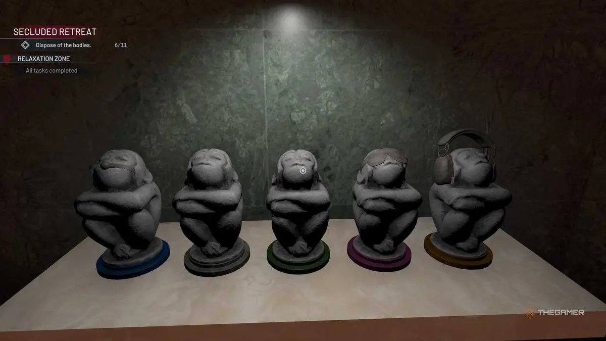 Crime Scene Cleaner monkey statues lined up.