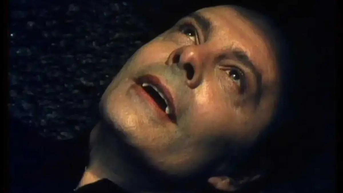 Louis Jourdan as Dracula showing his teeth in Count Dracula