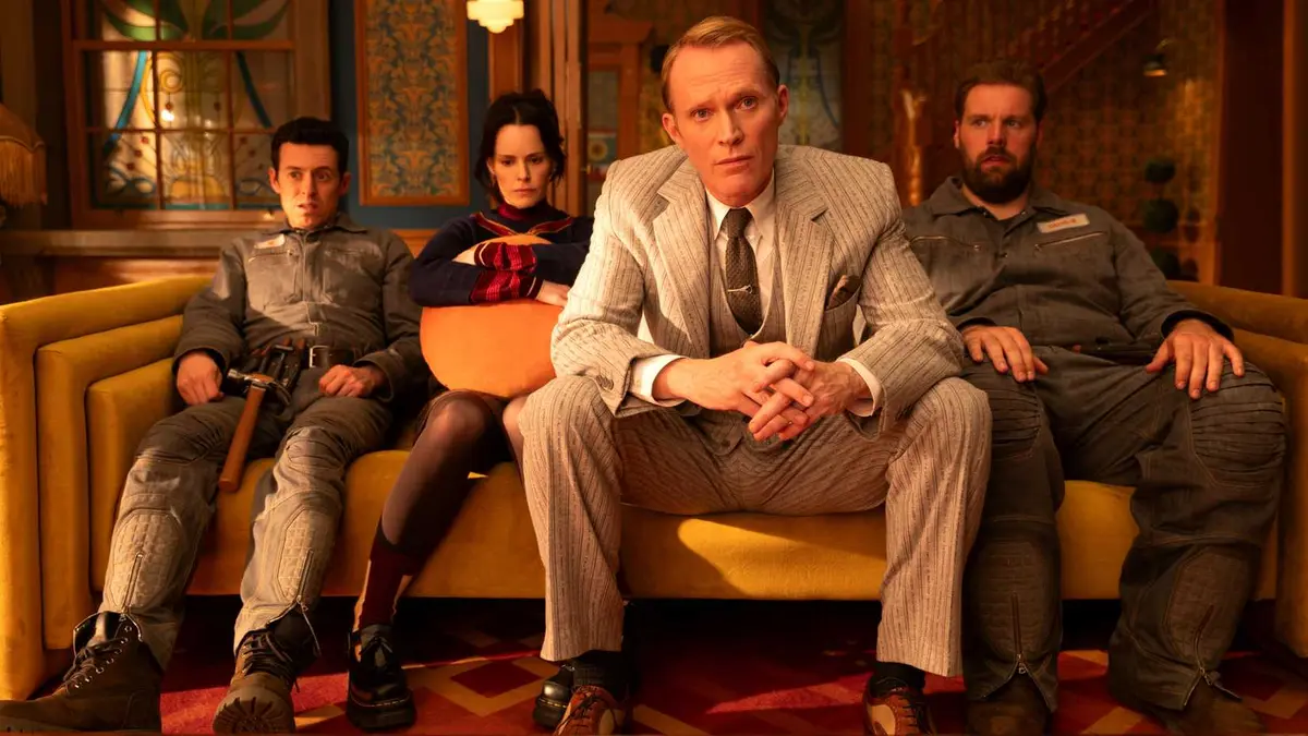 U, EDITH, Vision, and DUM-E in human avatar form sitting on a couch in VisionQuest