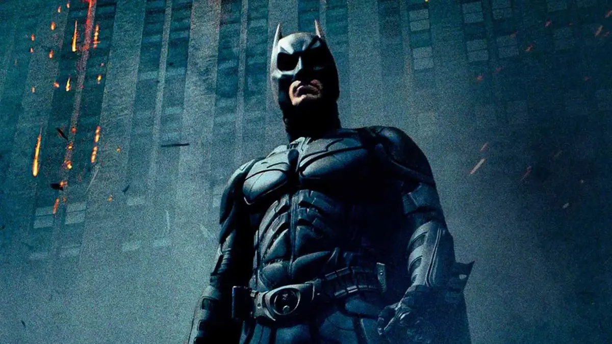 Batman looks on in a scene from The Dark Knight