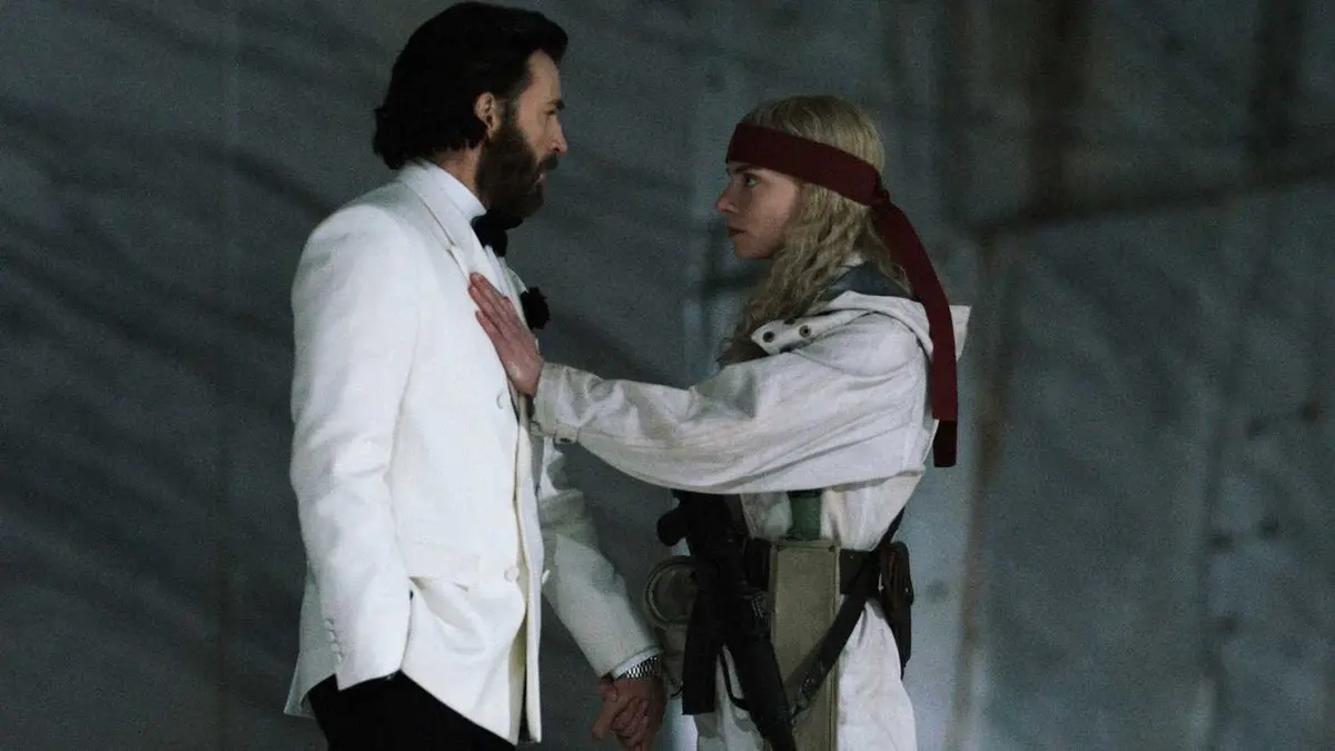 Anya Taylor-Joy putting a hand on Chris Evans' chest in Sacrifice