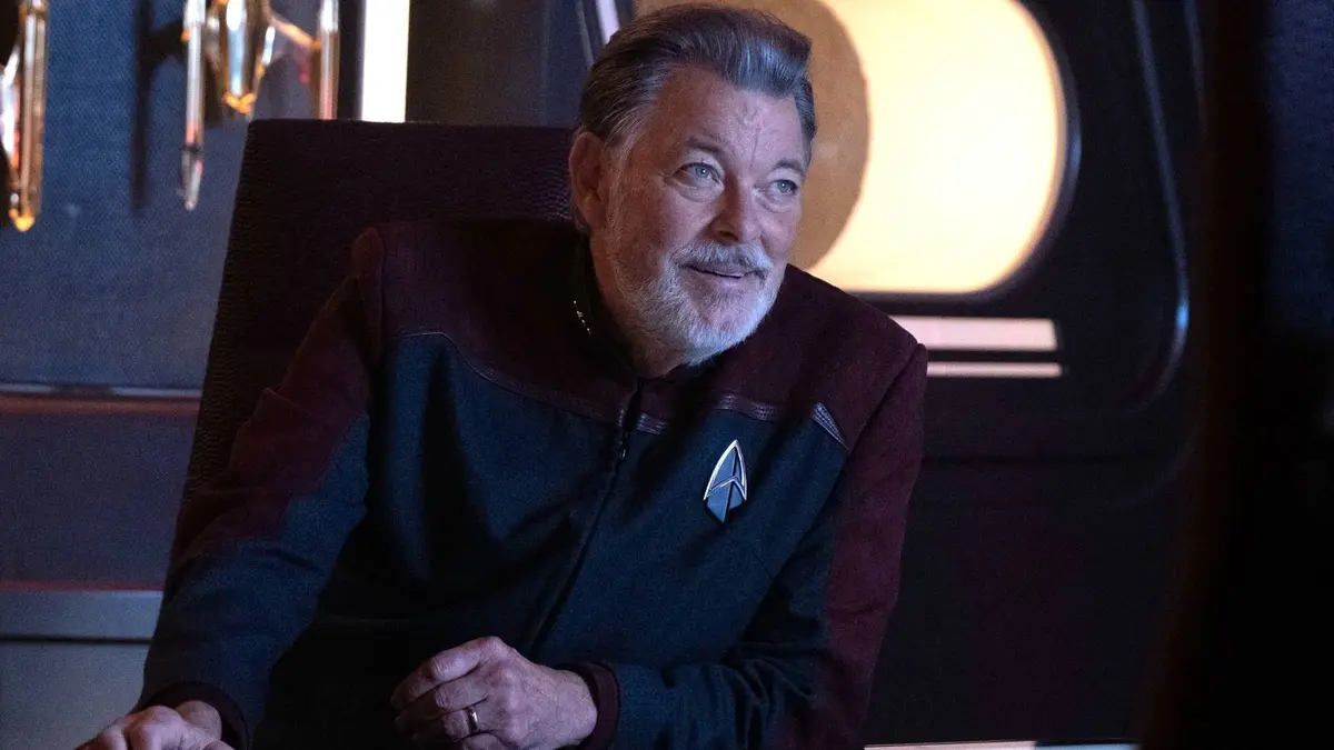 Jonathan Frakes smiling as Captain Riker