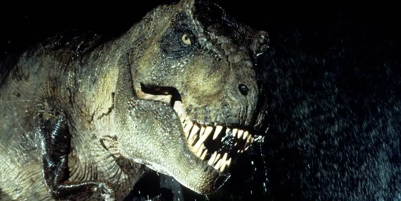 The T. rex stands in the rain in Jurassic Park
